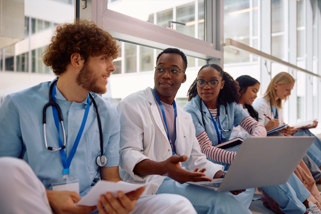 medical colleagues e-learning on laptop