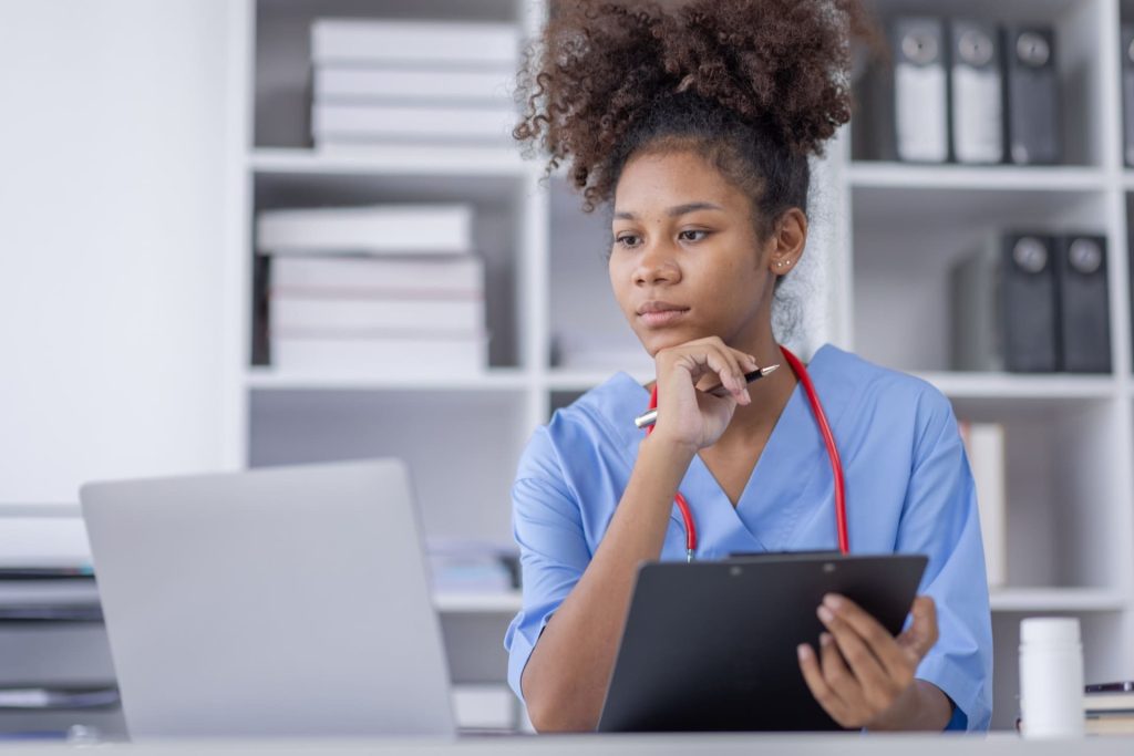 concentrating medical professional at desk