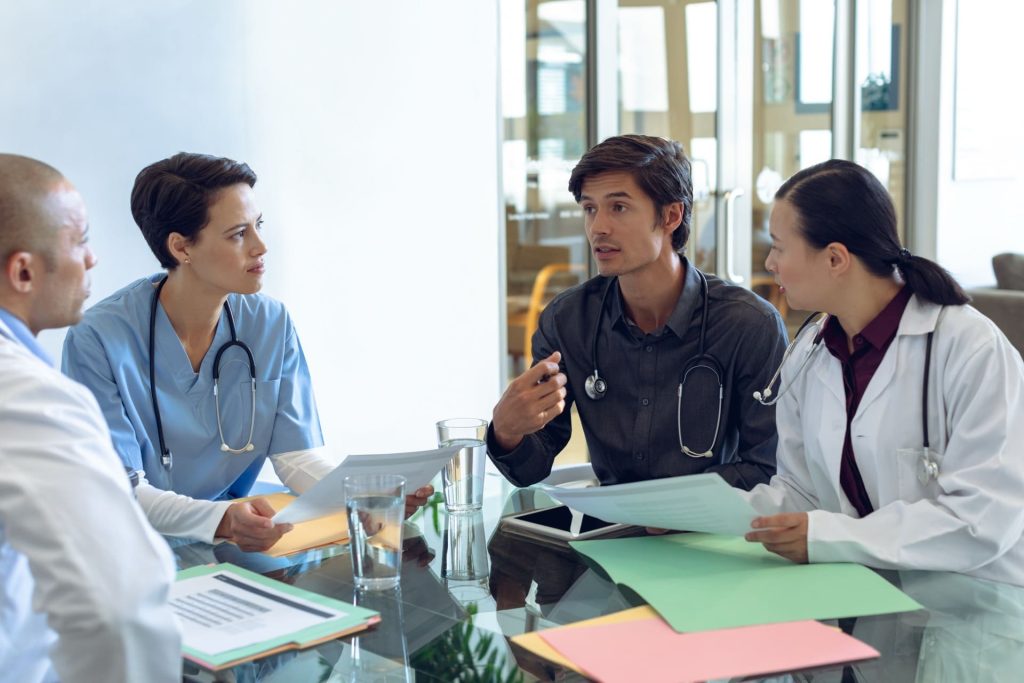 medical team discussing patient