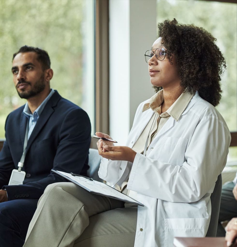 professionals gather for corporate meeting